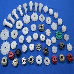 Crown/umbrella pinion gear at nail gear